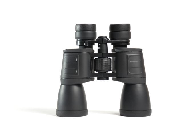 Close-Up Of Binoculars On Black Background