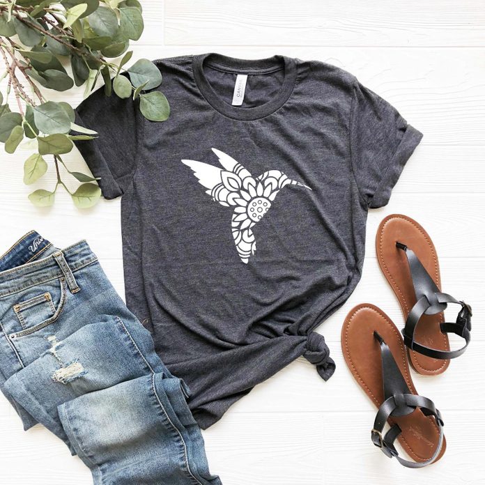 A dark gray t-shirt with a hummingbird graphic.