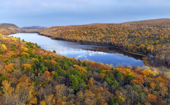 Fall foliage surrounding Lake of the Clouds in Michigan's Porcupine Mountains