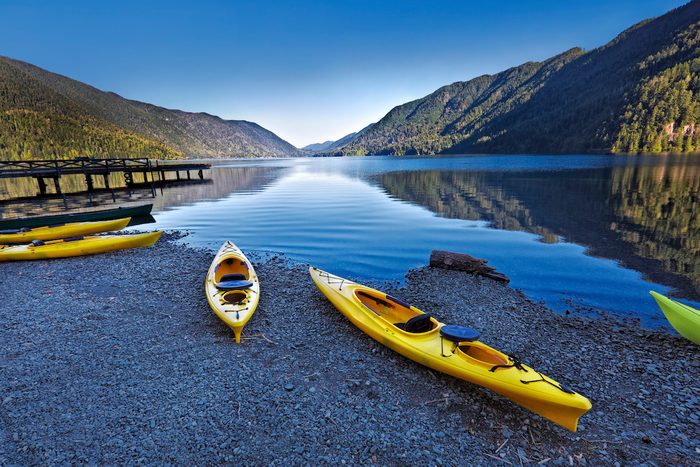 Olympic National Park in Washington State of United States. Water sport of canoes and kayaks at Lake Crescent.
