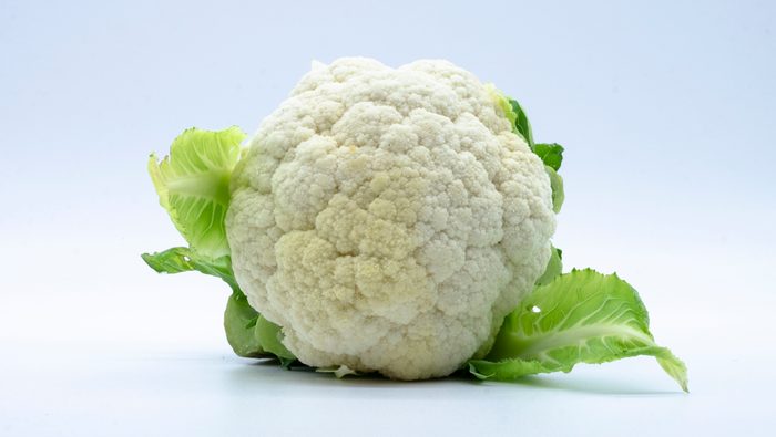 spring vegetables, isolated cauliflower on white background