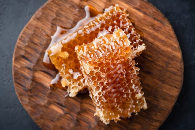 Honeycombs on wooden serving board