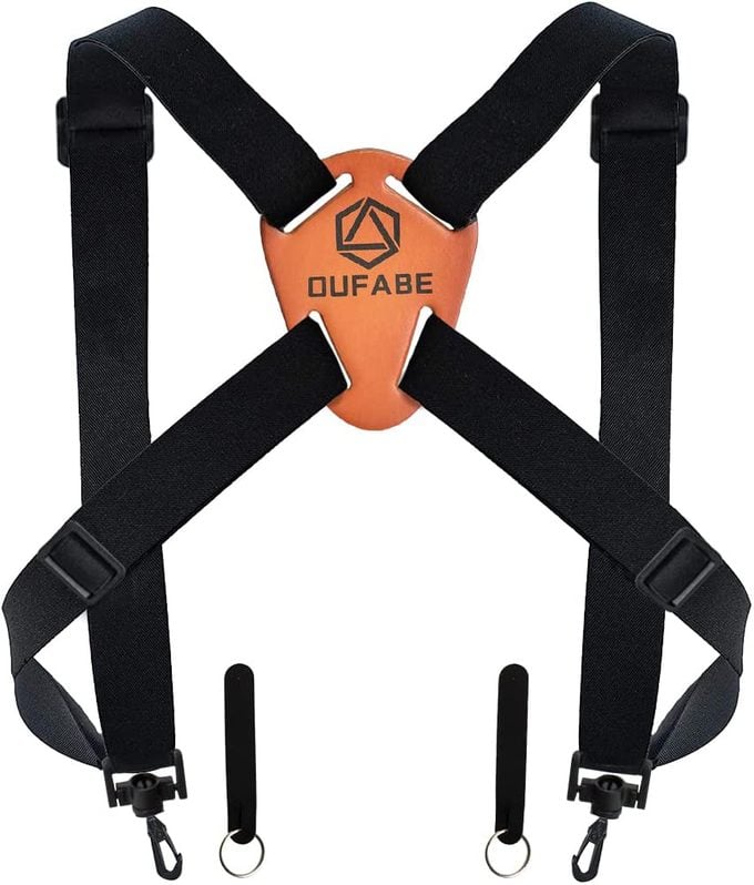 A binocular and camera harness that redirects the item's weight off the wearer's neck.