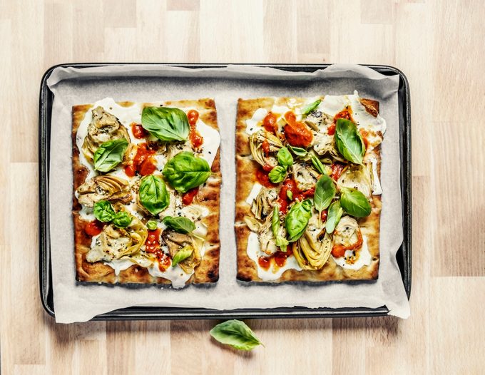 A Tray Of Vegetarian Homemade Pizza On Wooden Background