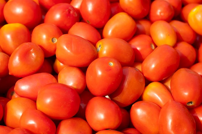 Full Frame Shot Of Tomatoes For Sale At Market